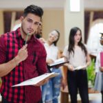 imgi_51_man-looking-pensively-holding-notebook_23-2147663965