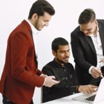 three-men-discussing-ideas-white-wall-indian-nationality (1)