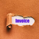 Invoice written under torn paper.