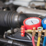 Car air conditioner check service leak test and fill refrigerant.