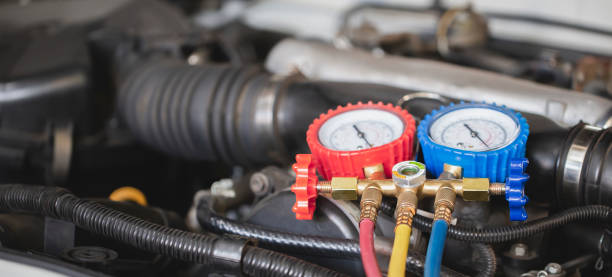 Car air conditioner check service leak test and fill refrigerant.