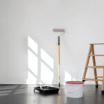 Painting the room, empty apartment ready for renovation, with copy space