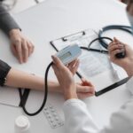 doctor-checking-medical-condition-patient-scaled